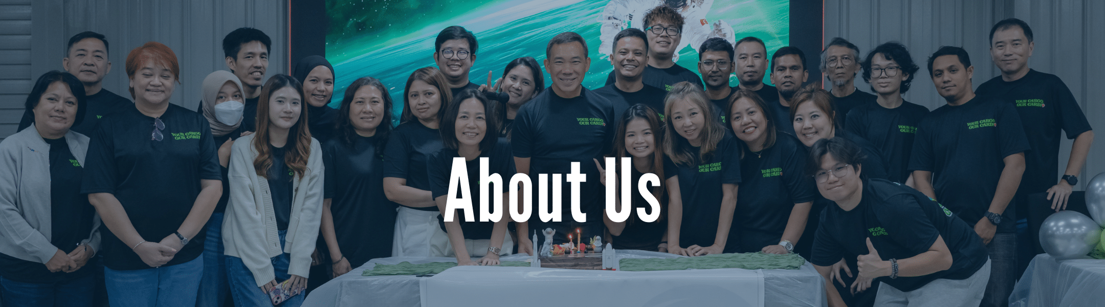 The Alliance 21 logistics team posing together during a CEO Townhall, highlighting teamwork.